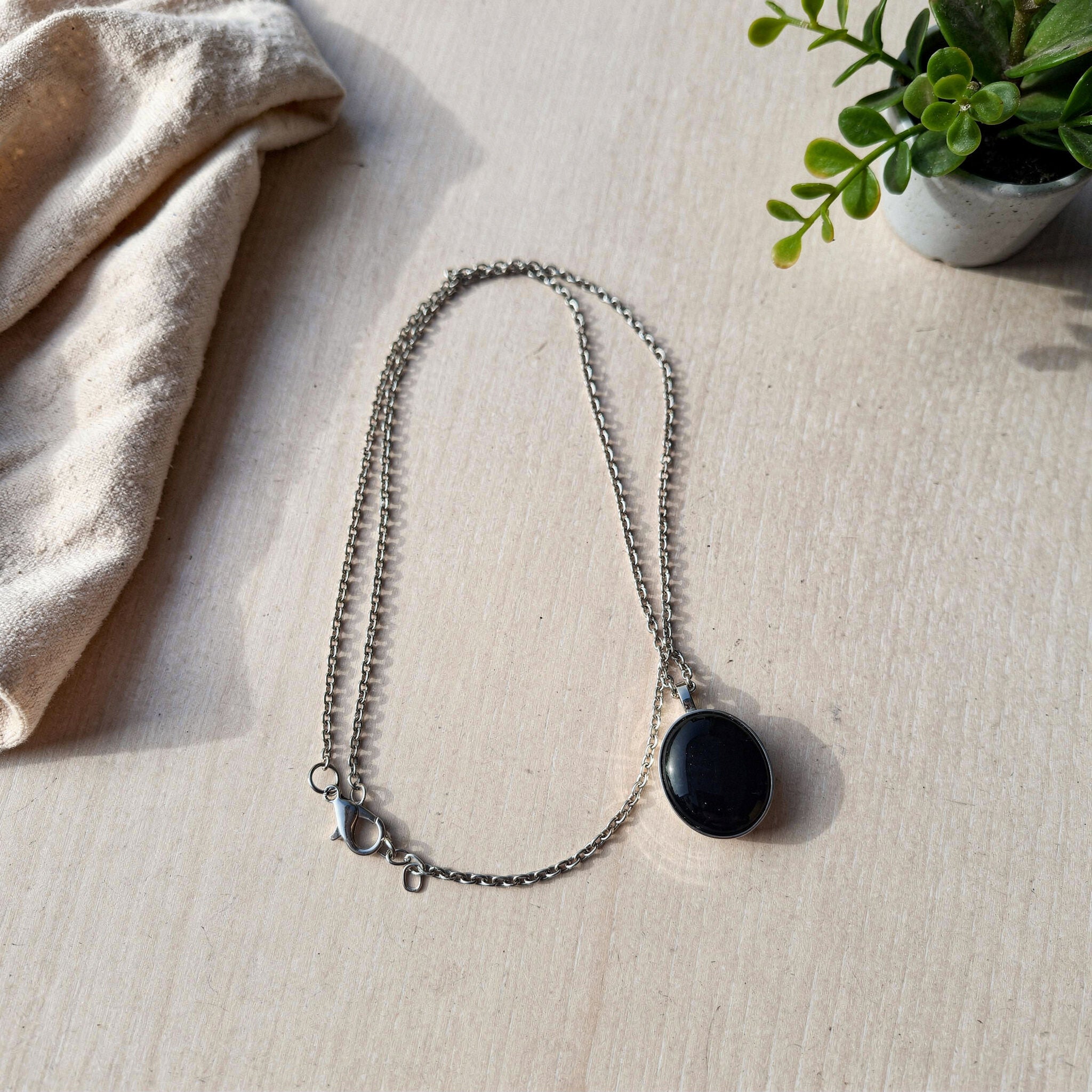 Black Onyx Oval Pendant | Silver Tone Grounding Chain