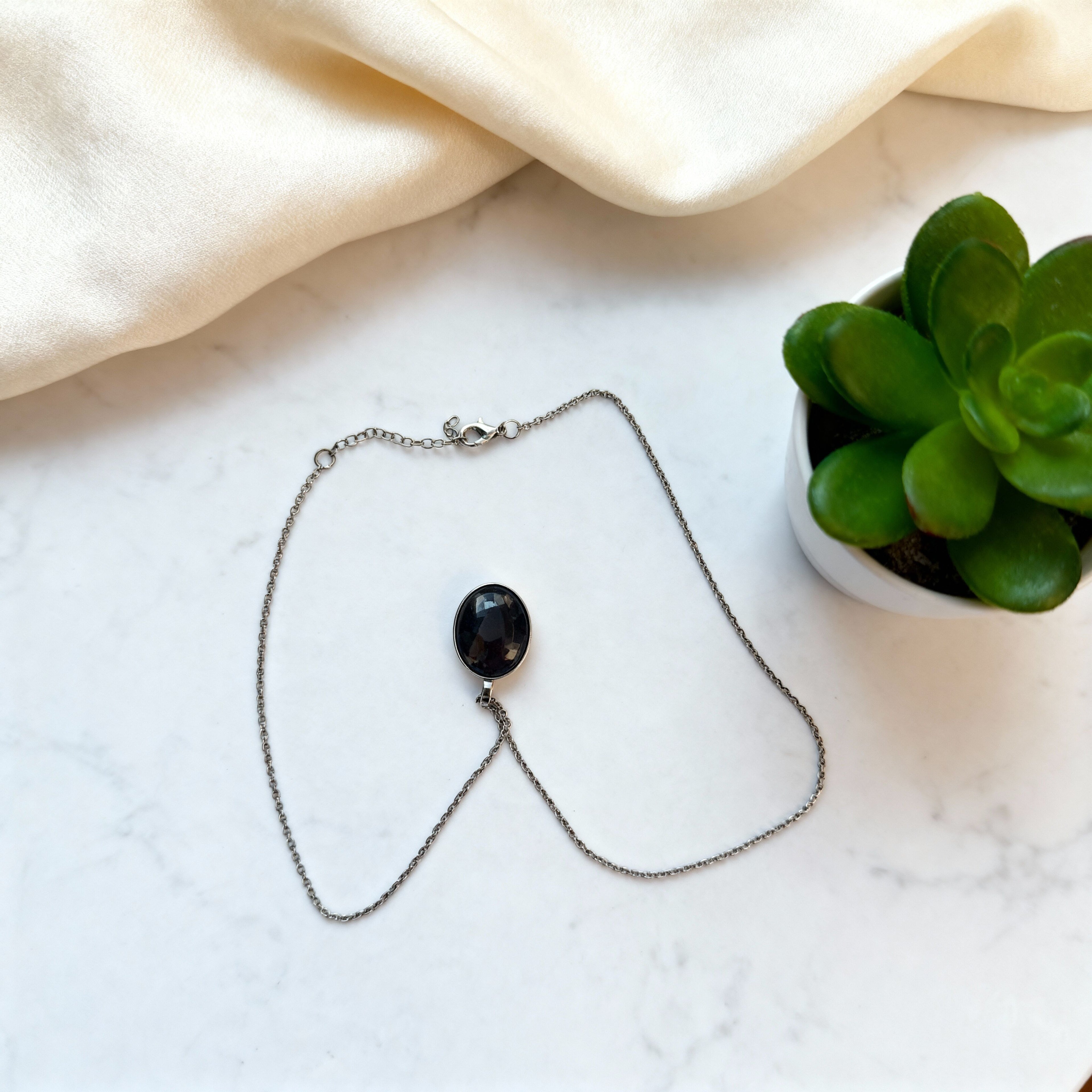 Black Onyx Oval Pendant | Silver Tone Grounding Chain